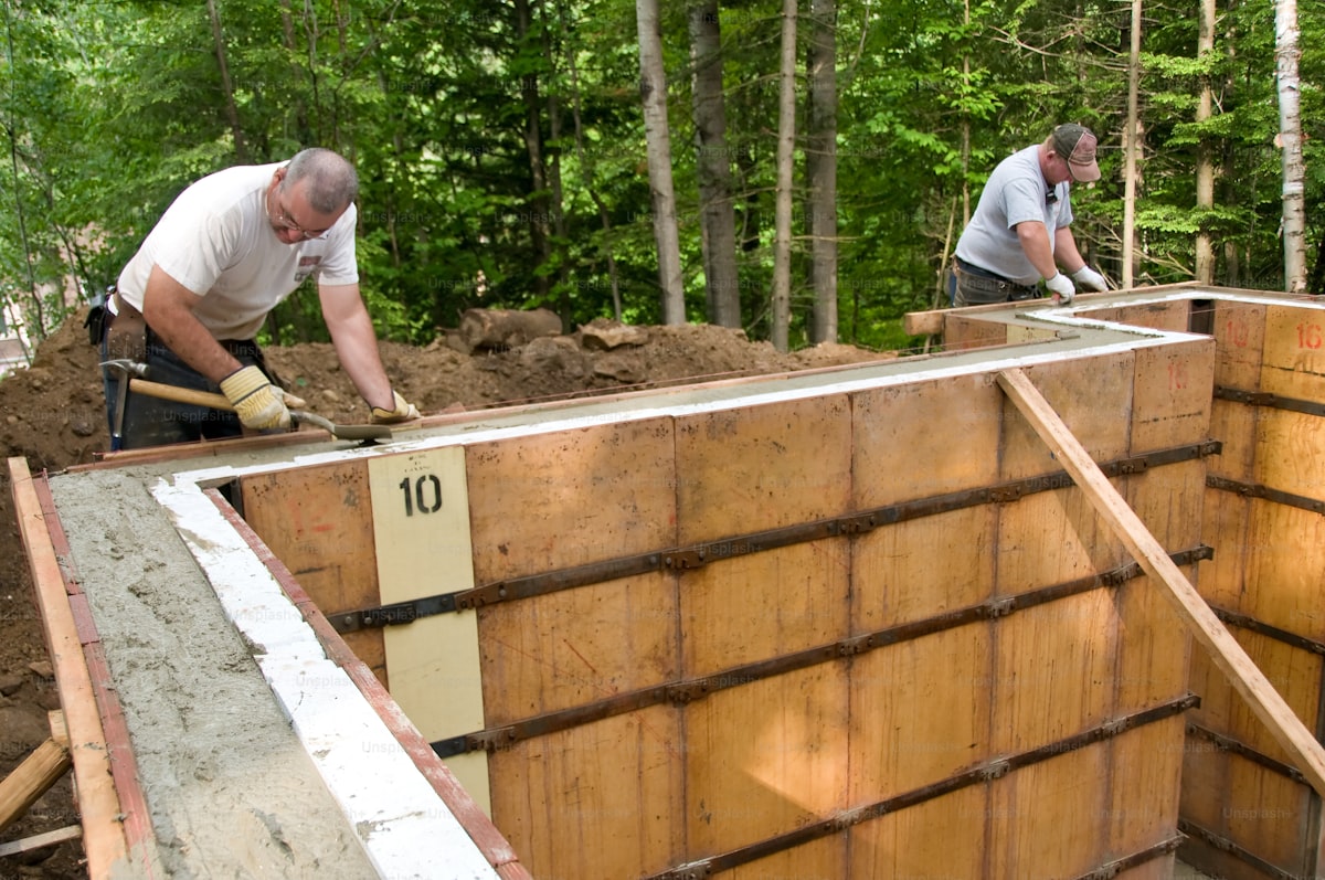 Construction workers building a resilient structure in a tropical setting