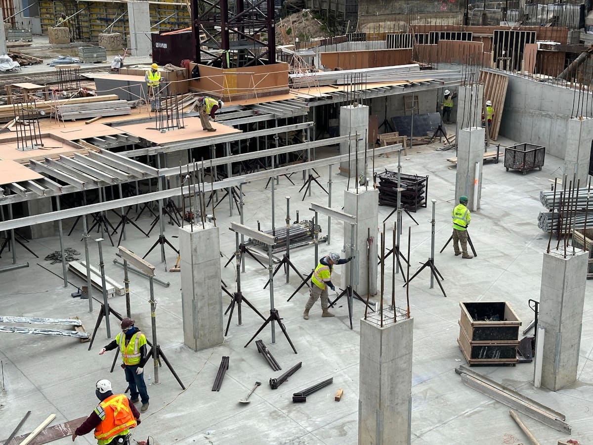 Building under construction with reinforced framework