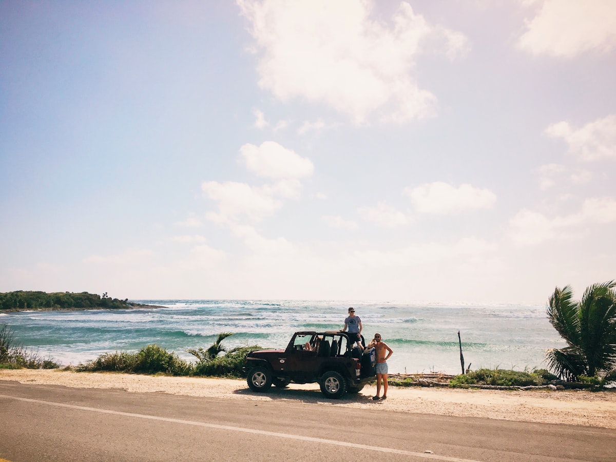 Vehicle driving through rural tropical terrain